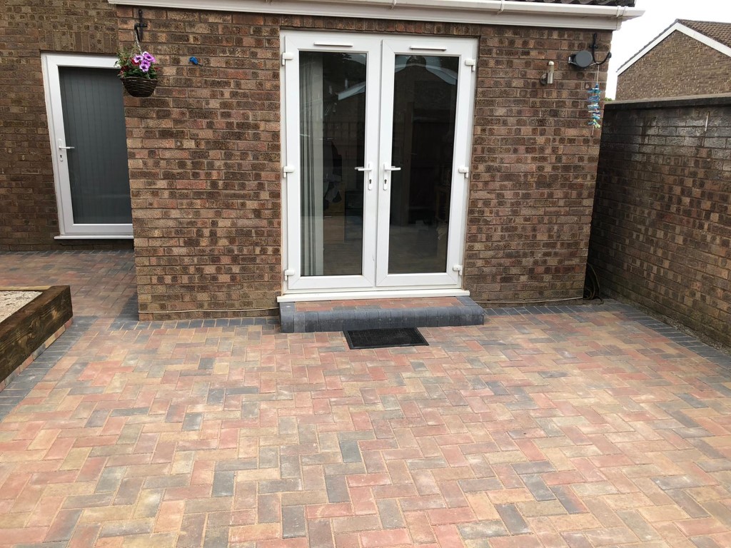 Patios with sandstone, porcelain in Effin